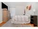 Bedroom with neutral colors and wood floors at 1315 Vista Del Lago Blvd, Dundee, FL 33838