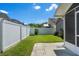 Backyard with a patio and a white privacy fence creating a peaceful and secluded outdoor space at 144 Bridgeton St, Davenport, FL 33896