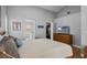 Spacious primary bedroom features vaulted ceiling, closet, and wood floors at 144 Bridgeton St, Davenport, FL 33896