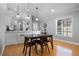 Comfortable dining room provides seamless transition to the kitchen offering an ideal setting for gatherings at 144 Bridgeton St, Davenport, FL 33896