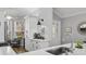 Bright, updated kitchen features an eat-in nook and stainless steel appliances at 144 Bridgeton St, Davenport, FL 33896