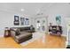 Spacious living room featuring hardwood floors and great lighting for a welcoming atmosphere at 144 Bridgeton St, Davenport, FL 33896