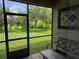 Enjoy the backyard view from the covered, screened patio at 14845 Speer Lake Dr, Winter Garden, FL 34787