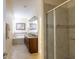 Spacious bathroom with double sinks, a soaking tub, and a tiled shower at 14845 Speer Lake Dr, Winter Garden, FL 34787