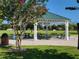 View of a gazebo featuring picnic tables and a trash can, perfect for outdoor gatherings at 14845 Speer Lake Dr, Winter Garden, FL 34787