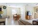 Living and dining area with tile floors, natural light, and open concept at 14845 Speer Lake Dr, Winter Garden, FL 34787
