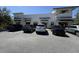 Commercial building with various businesses and ample parking at 14845 Speer Lake Dr, Winter Garden, FL 34787