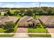 Beautiful single-Gathering home with a lush green lawn and a brick driveway at 1507 Alligator St, St Cloud, FL 34771