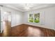 Bright bedroom with hardwood floors, natural light and spacious closets at 16610 County Line Rd, Umatilla, FL 32784
