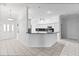 Open-concept kitchen with granite countertops, and breakfast bar at 16950 Se 80Th Bellavista Cir, The Villages, FL 32162