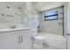 Nicely remodeled bathroom features a tub and shower combination with a modern vanity at 1920 Dardanelle Dr, Orlando, FL 32808