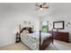 Bedroom with decorative bed frame and view of the beautiful outdoors at 2085 Stone Cross Cir, Orlando, FL 32828