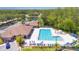 Aerial view of the community pool and clubhouse, offering resort-style amenities for residents at 2085 Stone Cross Cir, Orlando, FL 32828