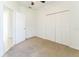 Bedroom with carpet, a ceiling fan, and a closet at 2110 Mallard Creek Cir, Kissimmee, FL 34743