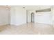Spacious living room featuring neutral paint, tile floors, and abundant natural light at 2110 Mallard Creek Cir, Kissimmee, FL 34743