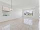 Bright living room with tile floors and lots of natural light at 2110 Mallard Creek Cir, Kissimmee, FL 34743