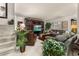 Comfortable living room with plush seating, an entertainment center, and ample natural light at 2208 Mcmahon Ct # 1033, Orlando, FL 32812