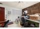 A comfortable office space with cork accent wall, closet space and natural lighting at 2208 Mcmahon Ct # 1033, Orlando, FL 32812