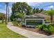 Dover Green Condominium community sign surrounded by well-maintained landscaping at 2208 Mcmahon Ct # 1033, Orlando, FL 32812
