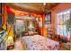 Cozy bedroom with bright decor, natural light, and a unique vintage aesthetic at 2320 E Crystal Lake Ave, Orlando, FL 32806