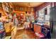 Rustic kitchen with wood cabinets, a vintage stove, and an eclectic decor at 2320 E Crystal Lake Ave, Orlando, FL 32806