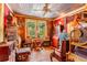 Unique living space with a corrugated metal ceiling, vintage decor, and an abundance of natural light at 2320 E Crystal Lake Ave, Orlando, FL 32806