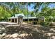 Community building with green roof and lush landscaping, perfect for gatherings and recreation at 2350 Derbyshire Rd, Maitland, FL 32751