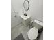 Clean bathroom featuring modern fixtures and a circular mirror at 2505 Osprey Creek Ct, Kissimmee, FL 34747