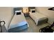 Bedroom with two twin beds, and a shared nightstand at 2505 Osprey Creek Ct, Kissimmee, FL 34747
