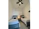 Bedroom with two twin beds, and a shared nightstand at 2505 Osprey Creek Ct, Kissimmee, FL 34747