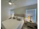 Bright bedroom featuring neutral tones, recessed lighting, and a ceiling fan at 2505 Osprey Creek Ct, Kissimmee, FL 34747