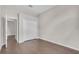 Bedroom features neutral walls, wood floors, closet, and is perfect for a minimalist aesthetic at 2675 Bond St, Clermont, FL 34711