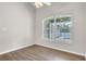 Bright bedroom with a large window overlooking the pool area at 2675 Bond St, Clermont, FL 34711