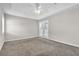 A bright bedroom with French doors leading to the pool at 2675 Bond St, Clermont, FL 34711