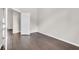 A bright, modern bedroom with hardwood floors and neutral wall paint at 2675 Bond St, Clermont, FL 34711