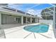 Beautiful pool area with covered patio and well maintained screen enclosure at 2675 Bond St, Clermont, FL 34711