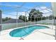 A screened-in pool offers cool respite in the Florida sun at 2675 Bond St, Clermont, FL 34711