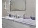 Close up of white vanity cabinet featuring a solid surface countertop at 2936 Estill St, Deltona, FL 32738