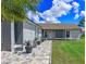 Well-maintained single-story home featuring a front walkway and landscaped garden at 2936 Estill St, Deltona, FL 32738