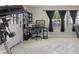 Bright home office featuring tile flooring, a modern desk and multiple windows at 2936 Estill St, Deltona, FL 32738