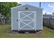 Well-maintained shed with a clean design and neutral color palette, perfect for storage at 2936 Estill St, Deltona, FL 32738