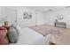 Bedroom featuring wood floors, neutral decor, and multiple entry doors and closets at 3029 Pinetree, Winter Haven, FL 33884