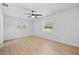 Inviting bedroom with wood floors, a ceiling fan, and ample natural light at 3029 Pinetree, Winter Haven, FL 33884