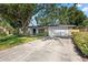 Charming home with a well-maintained lawn, stone accents, and a spacious two-car garage at 3029 Pinetree, Winter Haven, FL 33884