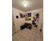 Entryway featuring tile flooring, shoe organizer and decorative wall decor at 306 Aylesbury Ct, Kissimmee, FL 34758