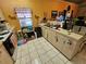 Functional kitchen offering ample counter space and essential appliances at 306 Aylesbury Ct, Kissimmee, FL 34758