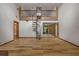 View of the living area with a spiral staircase leading to the second floor at 32125 Okaloosa Trl, Sorrento, FL 32776