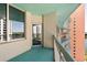 Condo balcony offers serene outdoor space with a view of other buildings and trees at 322 E Central Blvd # 1412, Orlando, FL 32801