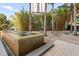 Relaxing courtyard featuring a tiled fountain, comfortable seating, and lush greenery for an inviting outdoor space at 322 E Central Blvd # 1412, Orlando, FL 32801