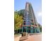 Exterior front view of a high-rise building showing its architecture, entry and fountain at 322 E Central Blvd # 1412, Orlando, FL 32801